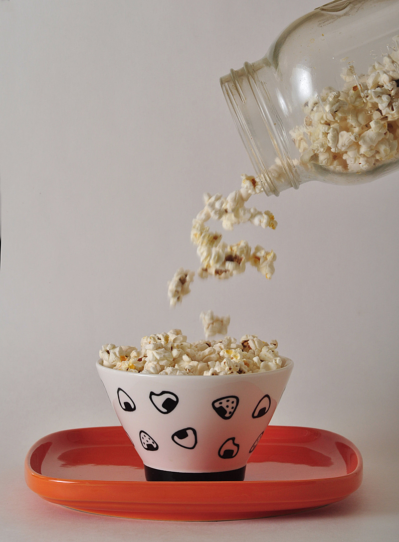 popped corn in container.